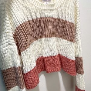 pink, tan,and white sweater